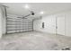 Spacious two-car garage with ample room for parking and storage at 8077 Tea Olive Ter, Palmetto, FL 34221