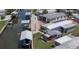Aerial view of waterfront homes with private boat docks along a serene canal at 108 W Saint Johns Way # 210, Apollo Beach, FL 33572