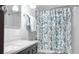 Nicely decorated bathroom with bright lighting and a modern vanity and shower at 108 W Saint Johns Way # 210, Apollo Beach, FL 33572
