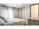 Bedroom featuring large closet with window view at 108 W Saint Johns Way # 210, Apollo Beach, FL 33572