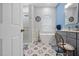 Elegant bathroom featuring stylish tile, a soaking tub, and a glass-enclosed shower at 1271 Candlelight Blvd, Brooksville, FL 34601