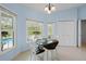 Bright breakfast nook featuring backyard views; direct access to a closet at 1271 Candlelight Blvd, Brooksville, FL 34601