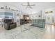 Bright and airy living room with tile floors and view to dining room at 1271 Candlelight Blvd, Brooksville, FL 34601