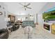 Cozy living room featuring a fireplace and access to the backyard at 1271 Candlelight Blvd, Brooksville, FL 34601