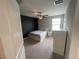 This bedroom features a ceiling fan and a modern, minimalist design at 1596 Ludington Ave, Wesley Chapel, FL 33543