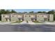 New townhomes feature an appealing exterior, individual garages, manicured lawns and sidewalks at 17265 English Chestnut Way, Land O Lakes, FL 34638