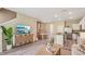 Spacious living space with kitchen and dining areas seamlessly connected for Gathering gatherings at 17469 Spanish Oak Loop, Land O Lakes, FL 34638