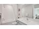 Bathroom with a shower-tub combination at 17491 Spanish Oak Loop, Land O Lakes, FL 34638