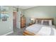 Bedroom featuring neutral decor and a comfortable bed at 17491 Spanish Oak Loop, Land O Lakes, FL 34638