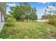The backyard features a shed and a lawn at 209 Se Jefferson N Cir, St Petersburg, FL 33702