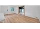 Bright room featuring wooden floors and natural light at 209 Se Jefferson N Cir, St Petersburg, FL 33702