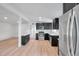 Open kitchen featuring stainless steel appliances and bright countertops at 209 Se Jefferson N Cir, St Petersburg, FL 33702