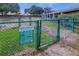 Fenced community dog park providing a safe and enjoyable area for pet owners and their furry friends at 225 Pompano Se Dr # D, St Petersburg, FL 33705
