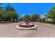 Circular driveway and fountain at the gated entrance of the community at 225 Pompano Se Dr # D, St Petersburg, FL 33705