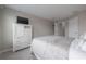 Bedroom featuring carpeted floor, tv on dresser and white furniture at 2469 Stapleford Pl, Wesley Chapel, FL 33543