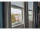 Window view of the lake from primary bedroom at 2469 Stapleford Pl, Wesley Chapel, FL 33543