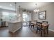 Bright kitchen and dining area with stainless steel appliances and sliding door to the patio at 2469 Stapleford Pl, Wesley Chapel, FL 33543