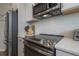 Updated kitchen featuring stainless steel appliances, subway tile backsplash, and modern cabinetry at 2469 Stapleford Pl, Wesley Chapel, FL 33543