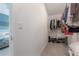 Spacious walk-in closet with organized clothing racks and shelving at 2469 Stapleford Pl, Wesley Chapel, FL 33543