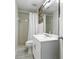 Small bathroom featuring a shower with a curtain and a white vanity with decorative wallpaper at 3633 Odom Dr, New Port Richey, FL 34652