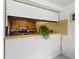Kitchen view with a breakfast bar overlooking the modern appliances at 3633 Odom Dr, New Port Richey, FL 34652