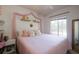 Comfortable bedroom featuring a cozy bed, bright windows, and neutral-toned decor at 3909 45Th W Ter # 102, Bradenton, FL 34210