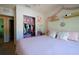 Comfortable bedroom with closet and decorative touches, plus a nice pink bedspread at 3909 45Th W Ter # 102, Bradenton, FL 34210
