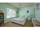 The bedroom is decorated with a unique bed, and a bookshelf that fits right in at 3909 45Th W Ter # 102, Bradenton, FL 34210