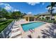 Outdoor community pool area with seating and a covered seating area at 3909 45Th W Ter # 102, Bradenton, FL 34210