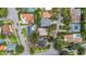 Aerial view of the property surrounded by trees, with a red outline at 403 Erie Ave, Tampa, FL 33606