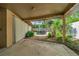 View of the backyard with pool, foliage and patio area at 403 Erie Ave, Tampa, FL 33606