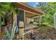 Outdoor covered storage/carport and pool equipment area located in rear at 403 Erie Ave, Tampa, FL 33606
