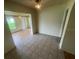 Open dining area with tile floors that flows into other parts of the home at 4611 W Mcelroy Ave, Tampa, FL 33611