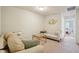 Relaxing upstairs loft with comfortable seating and neutral decor at 4935 White Sanderling Ct, Tampa, FL 33619
