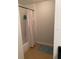 Tiled shower and floor in the bathroom at 501 Knights Run Ave # 2218, Tampa, FL 33602