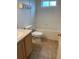 Cozy bathroom with white tiled walls and a bathtub, paired with a single-sink vanity at 5154 Balsam Dr, Land O Lakes, FL 34639