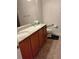 Bathroom featuring double sinks, granite countertops, and tile floors at 5473 Sunset Falls Dr, Apollo Beach, FL 33572