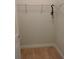 Walk-in closet with wood floor at 5473 Sunset Falls Dr, Apollo Beach, FL 33572