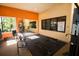 Bright community gym featuring workout equipment and ample natural light from large windows at 5473 Sunset Falls Dr, Apollo Beach, FL 33572