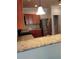 Open kitchen with granite countertops, stainless steel appliances, and warm wood cabinets at 5473 Sunset Falls Dr, Apollo Beach, FL 33572