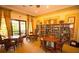 Charming community library with walls of books, comfortable seating, and warm, inviting decor at 5473 Sunset Falls Dr, Apollo Beach, FL 33572