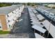 Aerial view of a community featuring covered parking and well-maintained landscaping at 6015 19Th N St # 117, St Petersburg, FL 33714