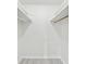 A walk-in closet with built-in shelving and ample storage space at 6015 19Th N St # 117, St Petersburg, FL 33714