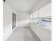 Enclosed porch area filled with natural light, offering extra space with large windows and a sliding glass door at 6015 19Th N St # 117, St Petersburg, FL 33714