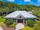 Beautiful clubhouse with manicured landscaping and brick and stone accents at 6218 Magnolia Park Blvd, Riverview, FL 33578