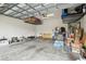 Spacious garage with overhead storage racks and plenty of room for parking at 6218 Magnolia Park Blvd, Riverview, FL 33578