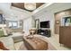Spacious living room featuring an open layout, recessed lights and stylish decor at 6218 Magnolia Park Blvd, Riverview, FL 33578