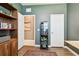 Functional office room with built-in shelving and ample storage space, featuring modern decor at 6218 Magnolia Park Blvd, Riverview, FL 33578