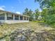 Fenced backyard showcasing the property's outdoor space at 6832 Treehaven Dr, Spring Hill, FL 34606