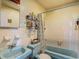 En suite bathroom with matching toilet, bathtub and sink at 6832 Treehaven Dr, Spring Hill, FL 34606